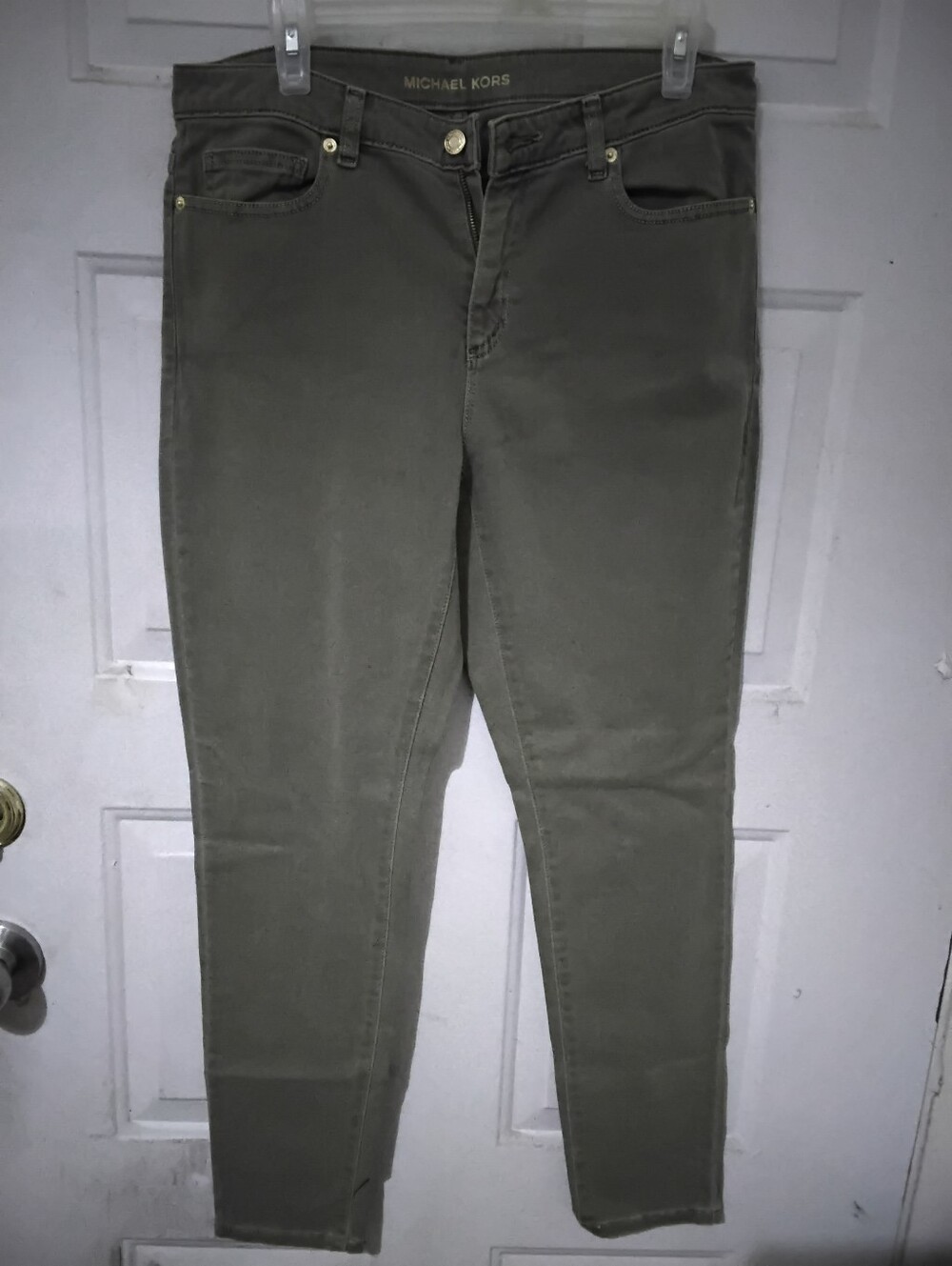 Michael Kors Women's Olive Skinny Jeans Size 10. Inseam Is around 29 or 30.